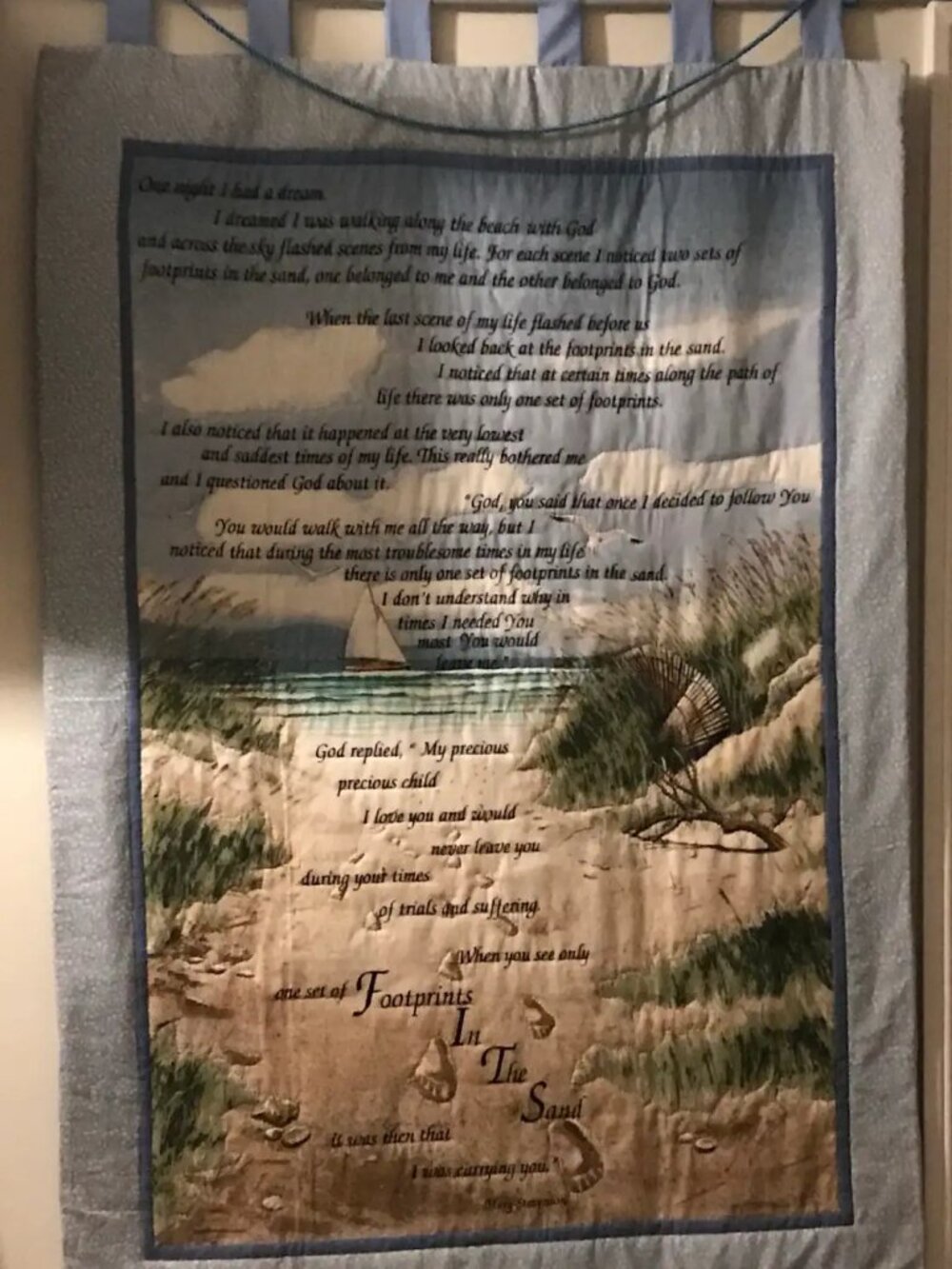 Quilted wall hanging with 'Footprints' prose